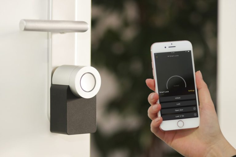 Nuki smart lock installed on a door for keyless entry