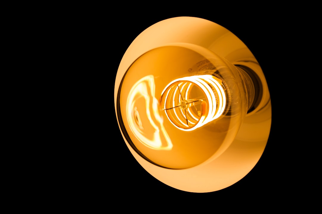 Philips Hue filament smart bulb glowing warm golden light